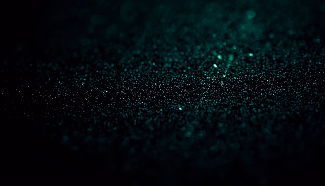 An extreme close-up of image grain with a faint signal distributed through the texture